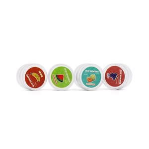 Detailed view of 5g fruit-scented eyelash extension glue remover jars in four flavors