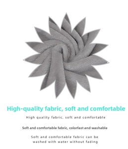 Detail of soft grey plush fabric petals showing washable and fade-resistant texture