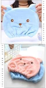 Detail of pink and blue microfiber hair towels with bear ears and elasticated cuffs