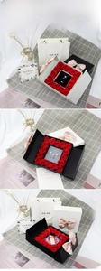 Close-up of eternal rose jewelry gift box with velvet necklace slot and ribbon card