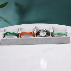 Detail view of 4-slot ice velvet jewelry tray with soft pillows for watches and bracelets