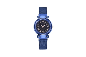 Detail of blue starry watch dial with Roman numerals and rose gold hands on mesh strap