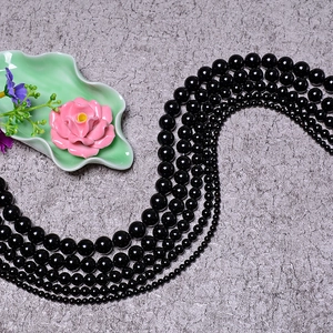 Polierte schwarze Onyx-Perlen im Wellenmuster für DIY-Schmuck und Halsketten