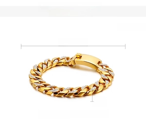 Macro shot of 18K gold plated stainless steel Cuban bracelet set with sparkling zircons