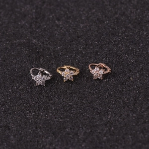Three-piece mini cartilage earrings set with star and flower designs in silver, gold and rose gold