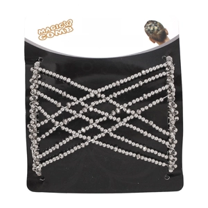 Detail of silver beaded elastic magic hair comb on brand packaging card with demo