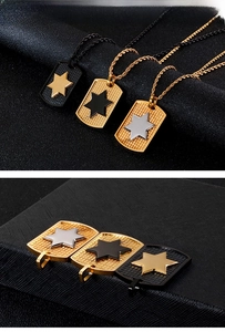 Detailed close-up of shield-shaped pendants with hexagram stars and textured mesh surface