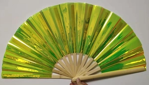 Macro view of a 33cm green laser film Kung Fu fan with natural bamboo ribs