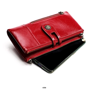 Side view of red vintage leather wallet showing spacious phone pocket and magnetic clasp