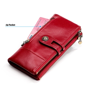 Detail view of red RFID blocking wallet featuring dual zippers and floral button buckle