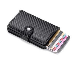 Detail view of carbon fiber card holder with automatic pop-up mechanism and metal buckle