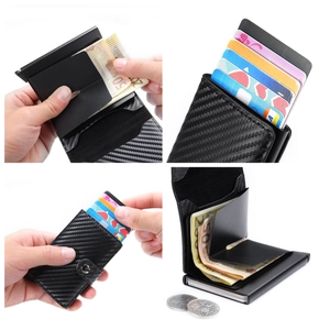 Detail view of carbon fiber wallet with card pop-up mechanism and coin compartment