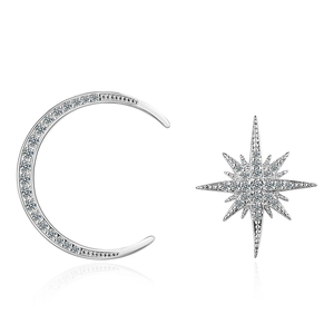 Asymmetric silver moon and star stud earrings with sparkling cubic zirconia stones
