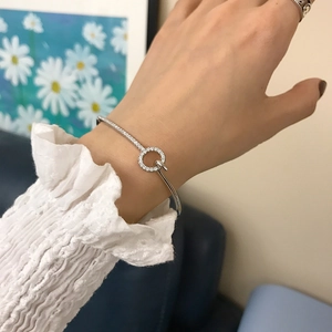 Elegant S925 sterling silver bangle with pavé zirconia circle buckle for women