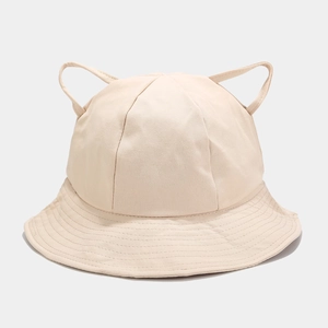 Detail of beige cotton bucket hat featuring cute cat ears and reinforced stitched brim