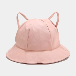 Detailed view of pink cotton bucket hat featuring decorative cat ears and stitched brim