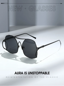Detailed close-up of black aviator sunglasses featuring double bridge and mesh side shields