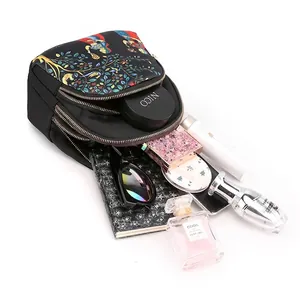 Waterproof nylon backpack with ethnic patterns and multiple zipper compartments