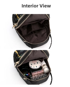Interior view of the water-resistant oxford bag showing multi-layer storage compartments
