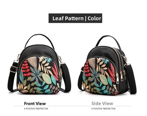 Water-resistant black nylon mini backpack with leaf print and multiple zippers