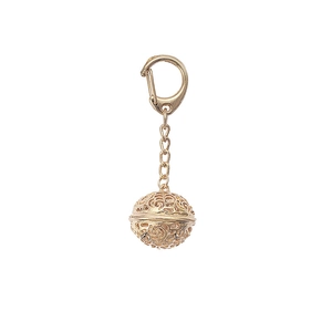 Golden hollow sphere keychain with intricate filigree patterns and spring clasp hook