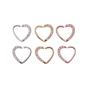 Set of six minimalist heart-shaped nose rings and earrings with micro-pave cubic zirconia