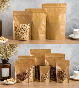 Detailed close-up of stand-up kraft paper pouches with window for food and nuts