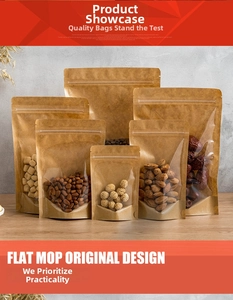 Standing kraft paper food pouches with clear window showing assorted nuts and grains