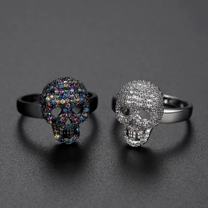 Hip-hop skull rings in black and silver finishes with colorful cubic zirconia stones