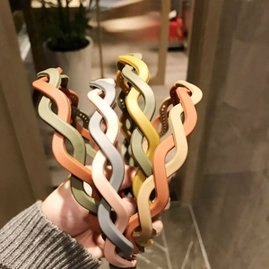 Matte candy-colored twisted wavy headbands in khaki, olive, pink and yellow shades
