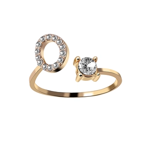 Adjustable gold open ring featuring a crystal-paved letter O and a solitaire round diamond