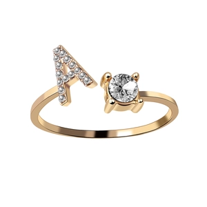 Adjustable gold ring featuring letter A with sparkling pave stones and a round solitaire