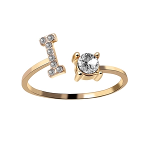 Adjustable gold open ring featuring a crystal-set letter I and round zircon stone