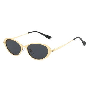 Retro oval sunglasses with golden metal frames and dark grey UV protection lenses