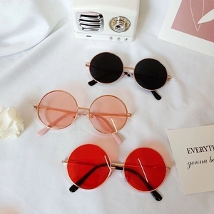 Retro round kids sunglasses with gold metal frames in black pink and red colors