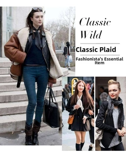 Chic winter styling with a warm thick cashmere scarf and trendy brown faux shearling jacket