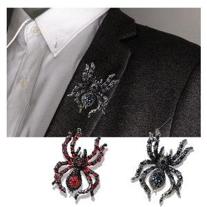 Exaggerated Halloween spider brooch with sparkling crystals in vintage silver alloy