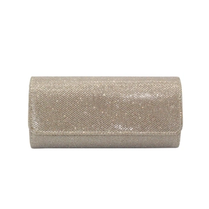 Macro shot of rectangular evening clutch with champagne gold glitter texture and flap closure