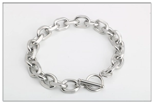 Detailed view of silver titanium steel cable chain bracelet featuring a toggle T-bar clasp