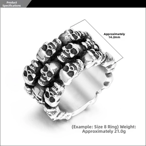 Detail view of the wide skull embossed titanium steel ring with gothic oxidized finish