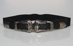 Vintage black elastic waist belt featuring ornate silver carved double buckle design