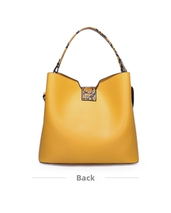 Rear view of the bright yellow faux leather tote bag with stylish snakeskin pattern handles