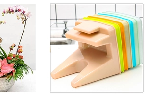 Close-up of colorful multifunctional stackable hooks for lids and cutting boards