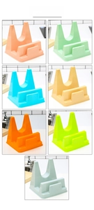 Kitchen organizer set showing seven vibrant colors of plastic pot lid and spoon rests