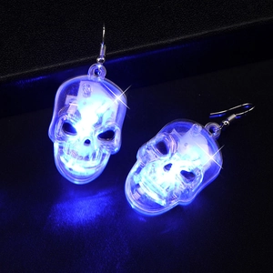 Luminous LED skull earrings with blue glow and transparent design for Halloween parties