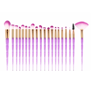 Detail view of 18-piece purple diamond handle makeup brush set with pink gradient bristles