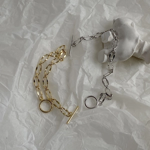 Detail of 925 sterling silver chunky chain bracelets with OT toggle clasps in gold and silver