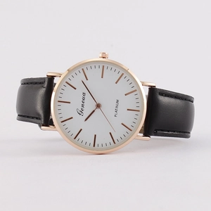Minimalist men's quartz watch with a white dial, rose gold case, and black leather strap