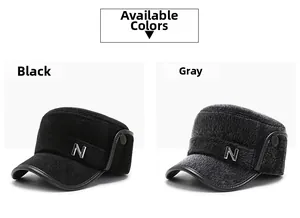 Detail of warm winter hats in black and grey with plush fur texture and metal N logo