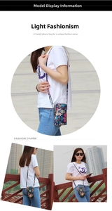 Vertical floral phone bag with multiple zipper compartments and adjustable strap